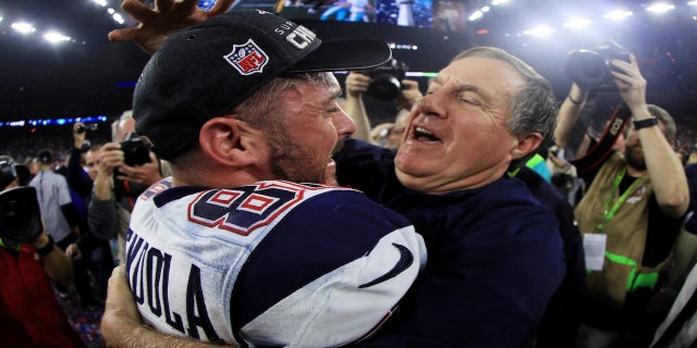 Danny Amendola #80 and head coach Bill Belichick of the New England Patriots celebrate after defeating the Atlanta Falcons 34-28 in overtime during Super Bowl 51 at NRG Stadium on Feb. 5, 2017 in Houston, Texas.