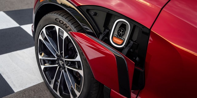 The Blazer EV's charging port opens automatically when approaching a charging station.