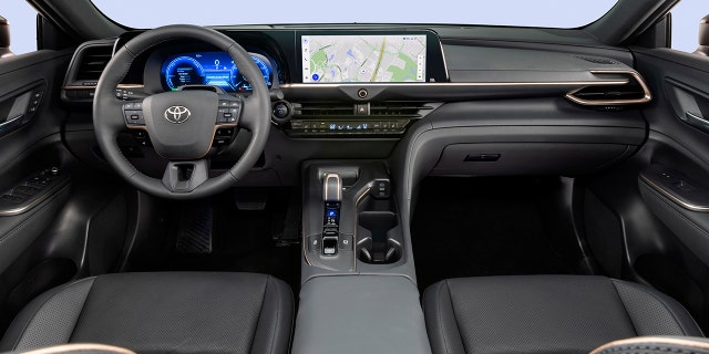 The Toyota Crown's interior features a higher seating position than a typical sedan.