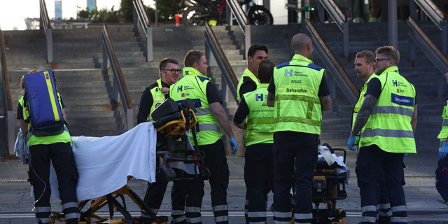 People are evacuated of the Fields shopping center in Copenhagen, Denmark, on July 3, 2022 after Danish media reported a shooting.