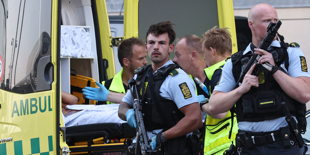 People are evacuated of the Fields shopping center in Copenhagen, Denmark, on July 3, 2022 after Danish media reported a shooting.