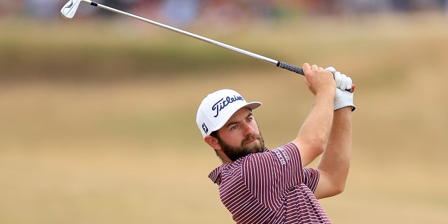 Cameron Young of the United States will play the second shot on the fifth hole in the final round of the 150th open on the Old Course of St Andrews on July 17, 2022 in St Andrews, Scotland.