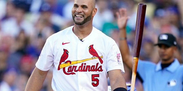 National League's Albert Pujols, of the St. Louis Cardinals, smiles during the MLB All-Star baseball Home Run Derby, Monday, July 18, 2022, in Los Angeles.