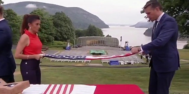 "Fox and Friends Weekend" co-hosts Rachel Campos-Duffy and Pete Hegseth partner up in folding the American flag on July 2, 2022.