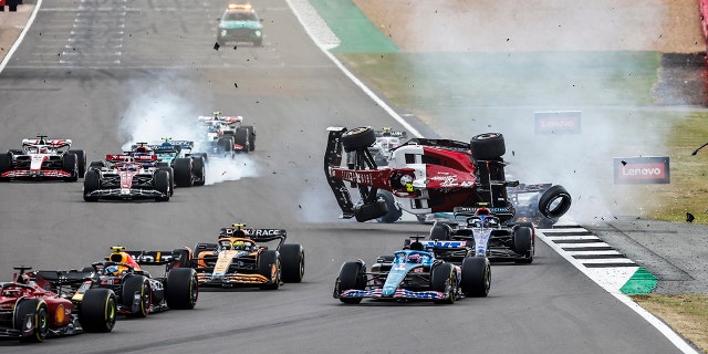 Zhou's Alfa Romeo was flipped entering the first turn of the British Grand Prix.