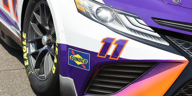 Hamlin was disqualified because of a strip of tape installed under his car's sponsor wrap at the lower corner of the front fascia ahead of the wheels. 