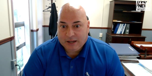 Hector Olmo, retired police officer