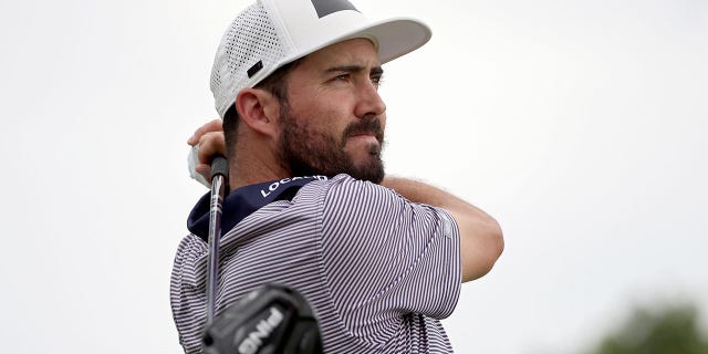 Mark Hubbard of the United States plays his shot from the 18th tee during the first round of the Rocket Mortgage Classic at Detroit Golf Club on July 28, 2022, in Detroit, Michigan.