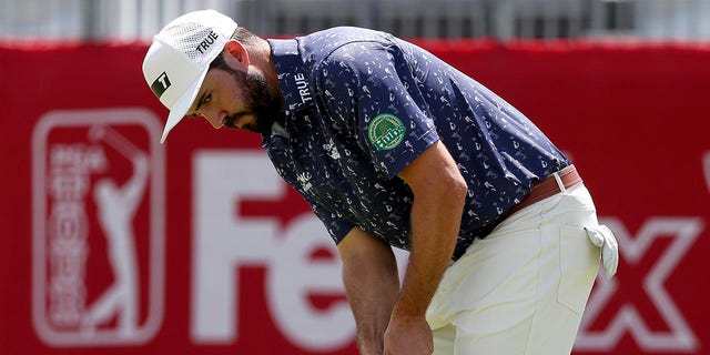 USA's Mark Hubbard putts on the 17th green during the second round of the Rocket Mortgage Classic at the Detroit Golf Club in Detroit, Michigan on July 29, 2022.