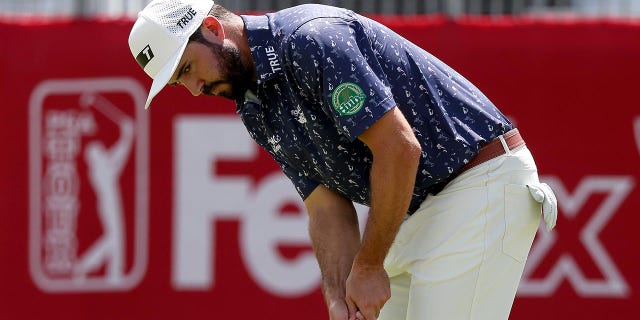 Mark Hubbard of the United States putts on the 17th green during the second round of the Rocket Mortgage Classic at Detroit Golf Club on July 29, 2022, in Detroit, Michigan.