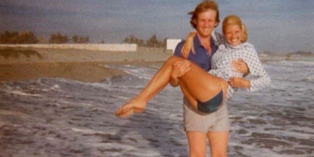 Ivana and Donald Trump on the beach.