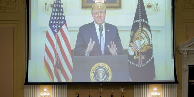 A video of former President Donald Trump played on a screen during a hearing of the Select Committee to Investigate the January 6th Attack on the US Capitol in Washington, D.C., US, on Thursday, July 21, 2022. 
