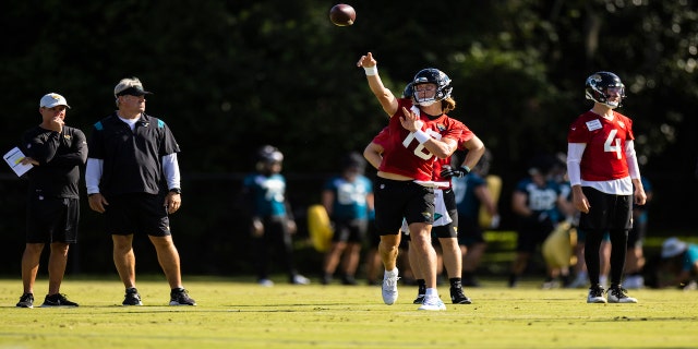 Trevor Lawrence #16 of the Jacksonville Jaguars throws a pass during Training camp on July 25, 2022 at Episcopal High School in Jacksonville, Florida.