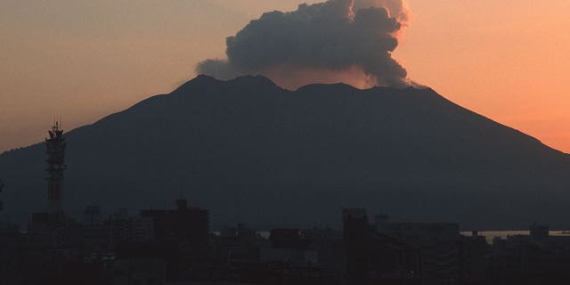 Sakurajima Volcano lets off some steam. About 7 thousand people live at the foot of this volcano, and Kagoshima city with a population of about half a million is located only ten kilometers to the west. Major eruptions occurred in 1476, 1779, 1914, 1946 and a smaller one in 1955, but the area within two kilometers of the summit remains an "off-limit zone". Sakurajima is 12 kilometers in diameter from east to west and 10 kilometers from north to south, with a circumference of 55 kilometers. The North Peak of the Sakurajima Volcano is 1117 meters (3665 feet), the Middle Peak is 1060 meters (3478 feet), and the South Peak is 1040 meters (3412 feet).