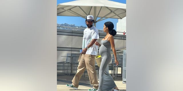 The "Above and Beyond" singer stay comfortable wearing a pair of white Birkenstock sandals, and carried a woven bag by her side with her curly hair tied back into a loose ponytail.  