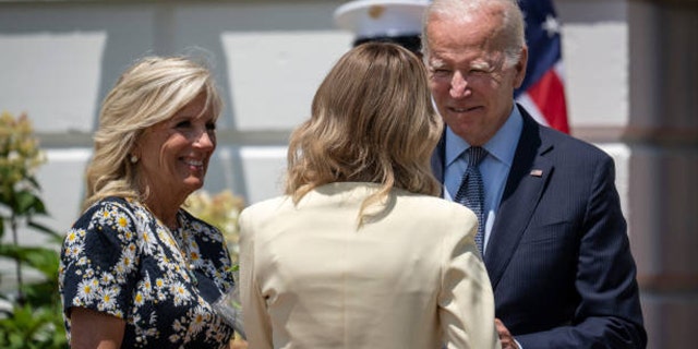 First lady Jill Biden and President Biden greet first lady Olena Zelenska as Zelenska arrives on the South Lawn of the White House, July 19, 2022.