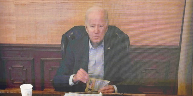 President Joe Biden virtually attends a meeting with his economic team in the South Court Auditorium on the White House complex in Washington, Friday, July 22, 2022. 