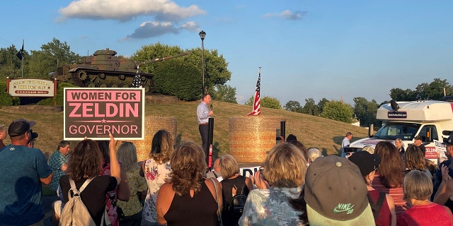 Congressman Lee Zeldin stands on stage during his stump speech, before an alleged attack on him, in Fairport, New York, United States, July 21, 2022. 