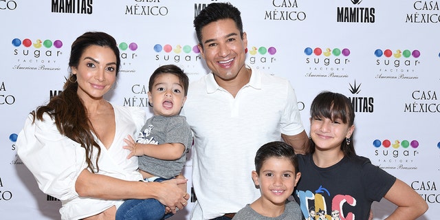 (L - R) Courtney Laine Mazza, Santino Lopez, Mario Lopez, Dominic Lopez and Gia Francesca Lopez attend and event to introduce the Mamitas Hurricane Goblet drink at Sugar Factory American Brasserie on August 07, 2021 in Los Angeles, California. (Photo by Michael Tullberg/Getty Images)