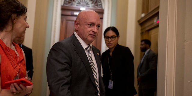 Democratic Arizona Sen. Mark outside the Senate chamber.