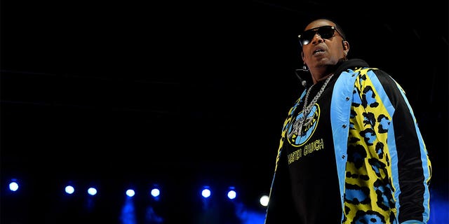 Master P lead the crowd in singing "You Are Not Alone," by Michael Jackson, a song his daughter loved during a performance in June. 