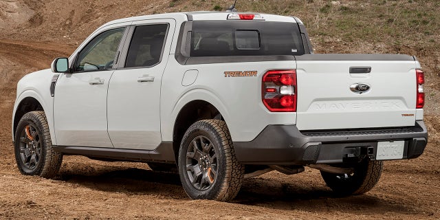 Preproduction vehicle shown with optional equipment. Available to order summer 2022 and arriving fall 2022. Closed course. Professional driver. Always consult the Owner’s Manual before off-road driving, know your terrain and trail difficulty, and use appropriate safety gear.