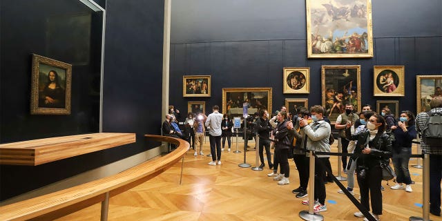 Millions make their way to the Louvre every year to catch a glimpse of the famous painting.