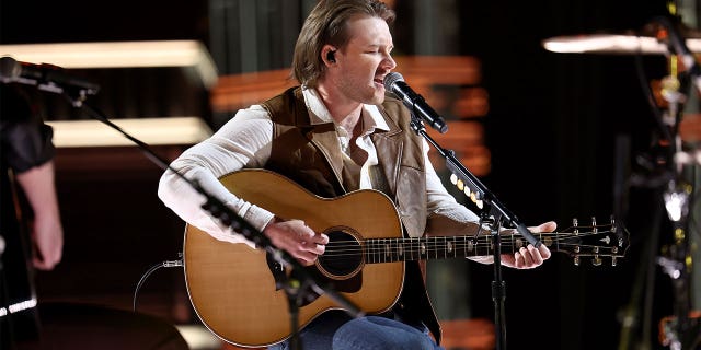 Morgan Wallen performing at the Billboard Music Awards