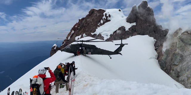Rescuers reached the injured climber about four hours after witnesses say he fell 600 to 700 feet from the summit ridge, authorities said.