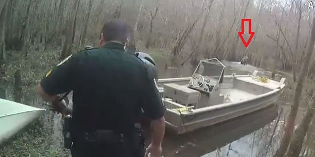 In this image taken in January, Mobley escapes from deputies and disappears into a swamp, the sheriff's office said.