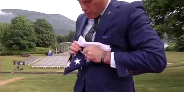 "Fox and Friends Weekend" co-host Pete Hegseth completes the folding of an American flag on July 2, 2022.