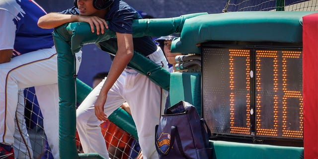 A pitch clock is deployed to restrict pitcher preparation times during a minor league baseball game between the Brooklyn Cyclones and Greensboro Grasshoppers, Wednesday, July 13, 2022, in the Coney Island neighborhood of the Brooklyn borough of New York. Major League Baseball is considering a pitch clock for next year along with shift limits, larger bases and restrictions on pickoff attempts.  