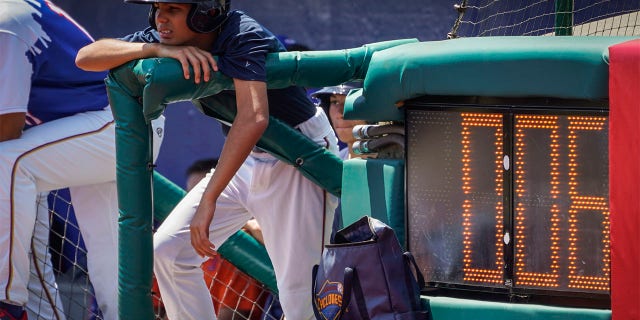 A pitch clock is deployed to restrict pitcher preparation times during a minor league baseball game between the Brooklyn Cyclones and Greensboro Grasshoppers, Wednesday, July 13, 2022, in the Coney Island neighborhood of the Brooklyn borough of New York. Major League Baseball is considering a pitch clock for next year along with shift limits, larger bases and restrictions on pickoff attempts.