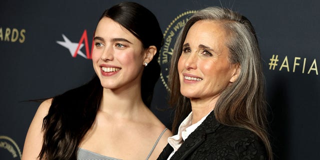 Andie MacDowell, right, poses alongside daughter and co-star of the Netflix show "Maid," Margaret Qualley on the red carpet.