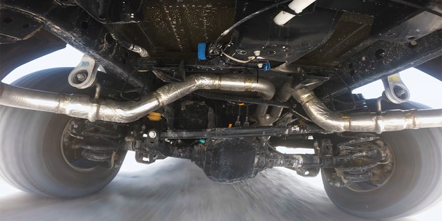 The F-150 Raptor R has a rear coil-spring suspension with 14.1 inches of travel.