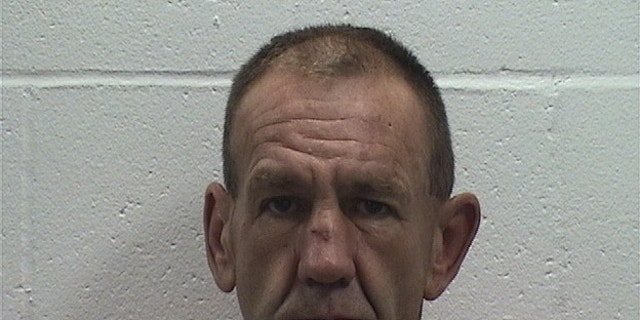 Larry Doil Sanders, 53, was charged with murder for allegedly killing another man while they were fishing. 