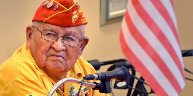 FILE - In this 2013 photo, Navajo Code Talker Samuel Sandoval talks about his experiences in the military in Cortez, Colo. Sandoval, one of the last remaining Navajo Code Talkers who transmitted messages in World War II using a code based on their native language, has died at age 98. Sandoval died late Friday, July 29, 2022, at a hospital in Shiprock, N.M., his wife, Malula told The Associated Press on Saturday. (Sam Green/The Cortez Journal via AP)