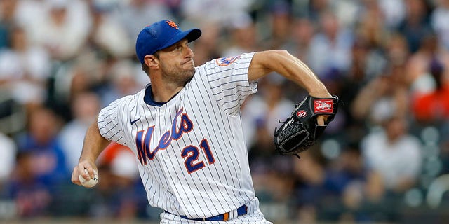 Max Scherzer, #21 of the New York Mets, pitches during the first inning against the New York Yankees at Citi Field on July 27, 2022 in New York City. The Mets defeated the Yankees 3-2.