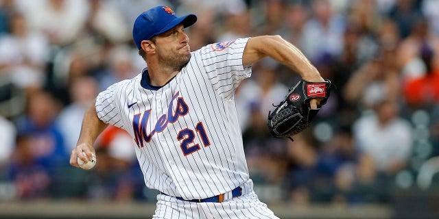 Max Scherzer, #21 of the New York Mets, pitches during the first inning against the New York Yankees at Citi Field on July 27, 2022 in New York City. The Mets defeated the Yankees 3-2.