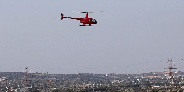 A helicopter takes off from Superior Air Helipad in Spata, near Athens, where a man died when helicopter propeller hit him after landing.