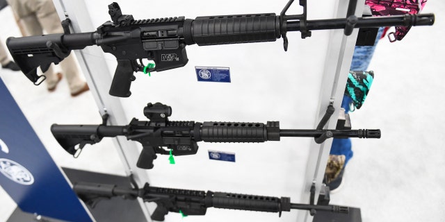 Smith &amp; Wesson M&amp;P-15 semi-automatic rifles of the AR-15 style are displayed during the National Rifle Association annual meeting at the George R. Brown Convention Center, in Houston, Texas on May 28, 2022.