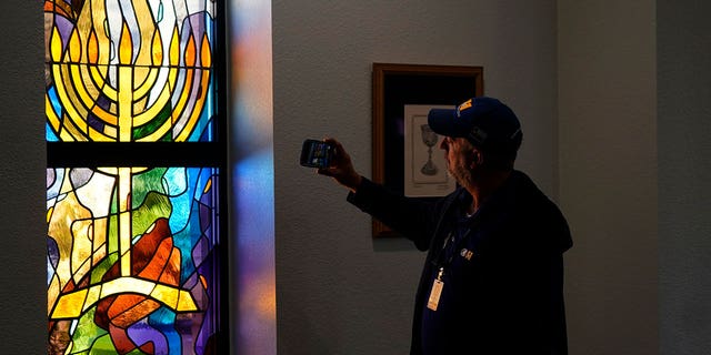 The stained glass window, which once had a hole in the ammunition, was repaired on Thursday, April 7, 2022 at Congregation Beth Israel in Colleyville, Texas. 