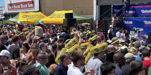 A crowd gathers to watch Nathan’s Famous Hot Dog Eating Contest at Coney Island on July 4, 2022. 