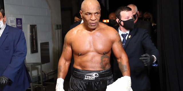 Mike Tyson exits the ring after receiving a split draw against Roy Jones Jr. during Mike Tyson vs Roy Jones Jr. presented by Triller at Staples Center on Nov. 28, 2020 in Los Angeles.