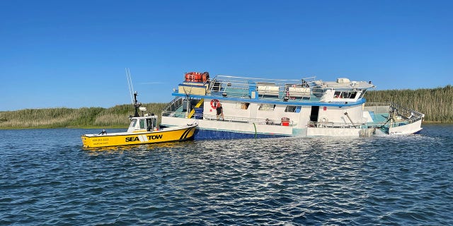 A Good Samaritan helped all 22 people aboard the sinking vessel to a dock in Sea Isle City, New Jersey.