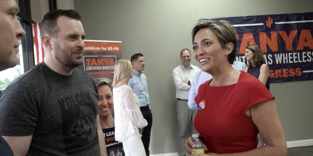 Tanya Wheeless chats with a potential voter.