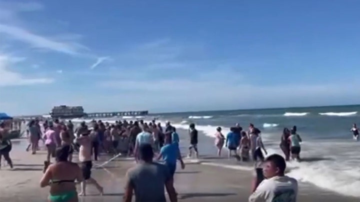 Daytona Beach attendees, including child, injured after car drives onto sand, crashes in ocean