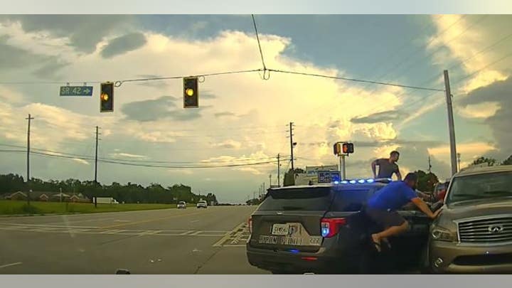 Georgia driver rams patrol cars during traffic stop in wild dashcam video Georgia driver rams patrol cars during traffic stop in wild dashcam video