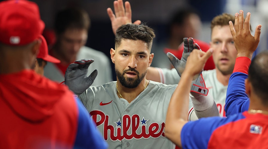 PHILADELPHIA, PA - MAY 21: Nick Castellanos #8 of the Philadelphia Phillies  reacts toward his bench after he hits a double during the game against the  Chicago Cubs at Citizens Bank Park