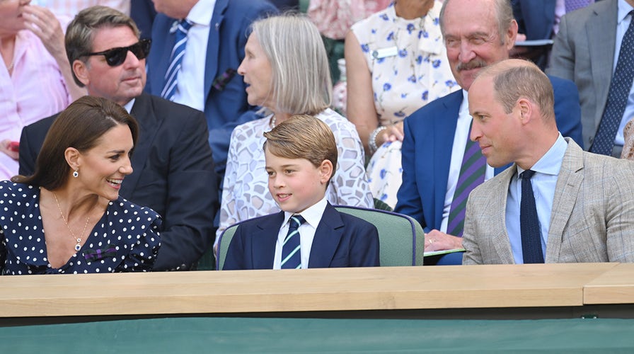 Prince George makes Wimbledon tennis debut in the Royal Box with the Duke and Duchess of Cambridge